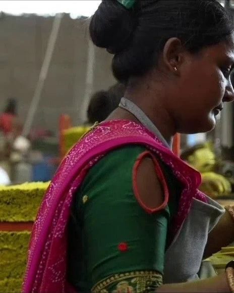 A Janak artisan hand-rolling incense sticks